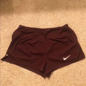 Nike maroon running shorts